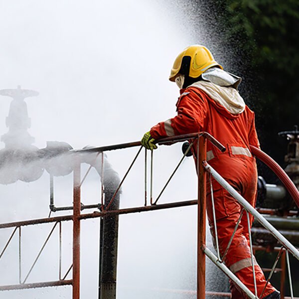 Fire fighter team on training with gas and oil fire at pipe line