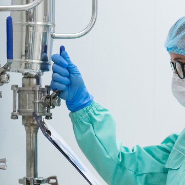 scientist in blue suit checking pressure