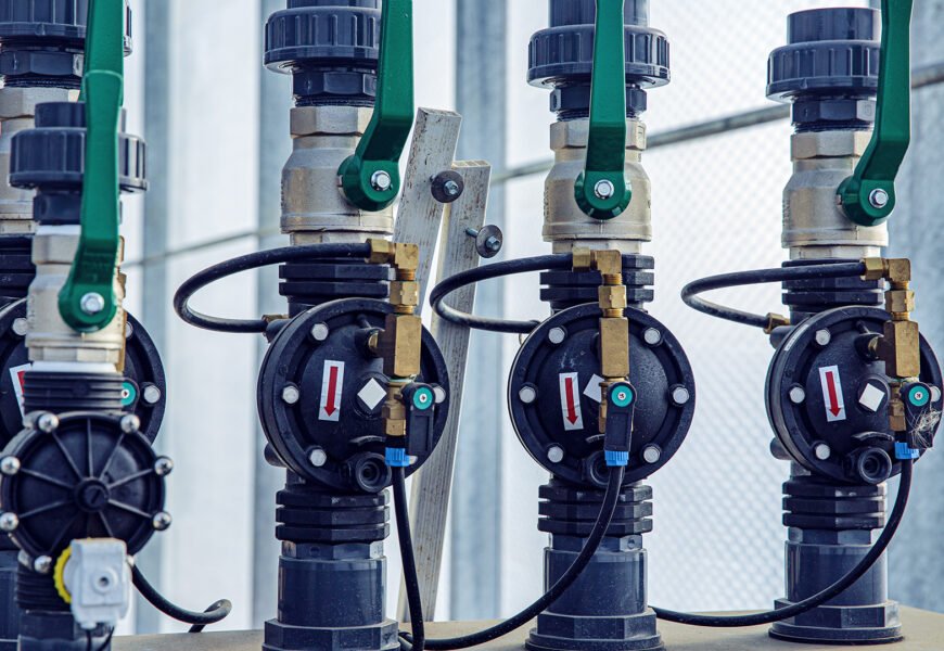 Valves, cables and piping as found inside of a modern industrial power plant